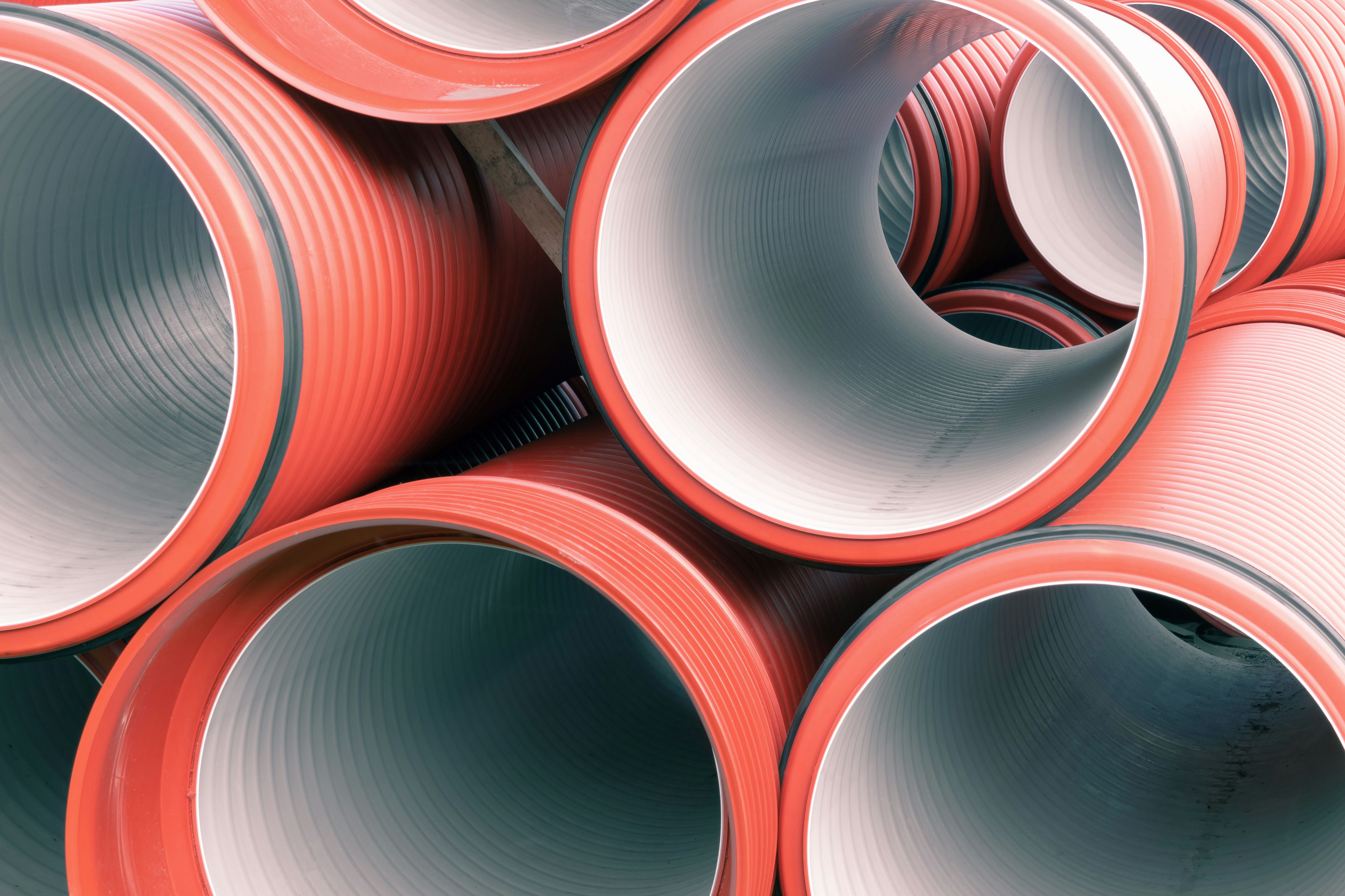 Close up of pipes stacked together