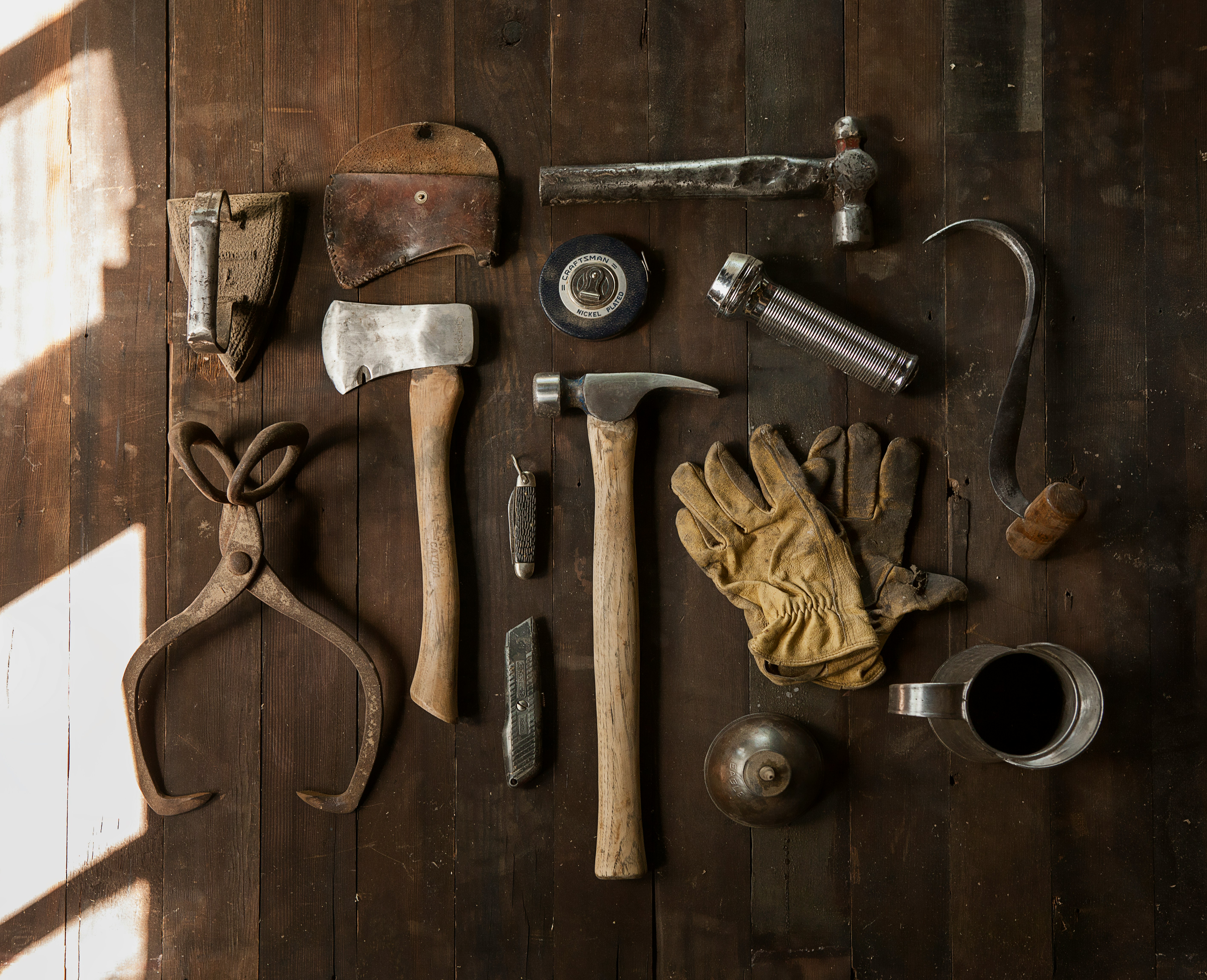 set of garden tools laid on a table